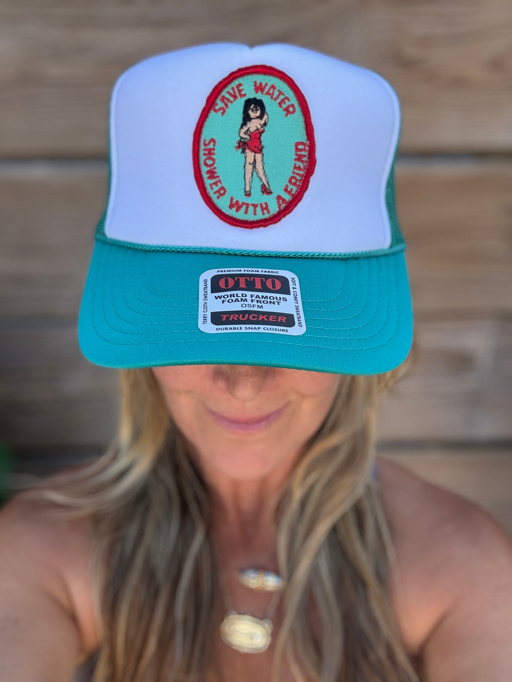 Trucker Hat featuring Vintage Patch- save water