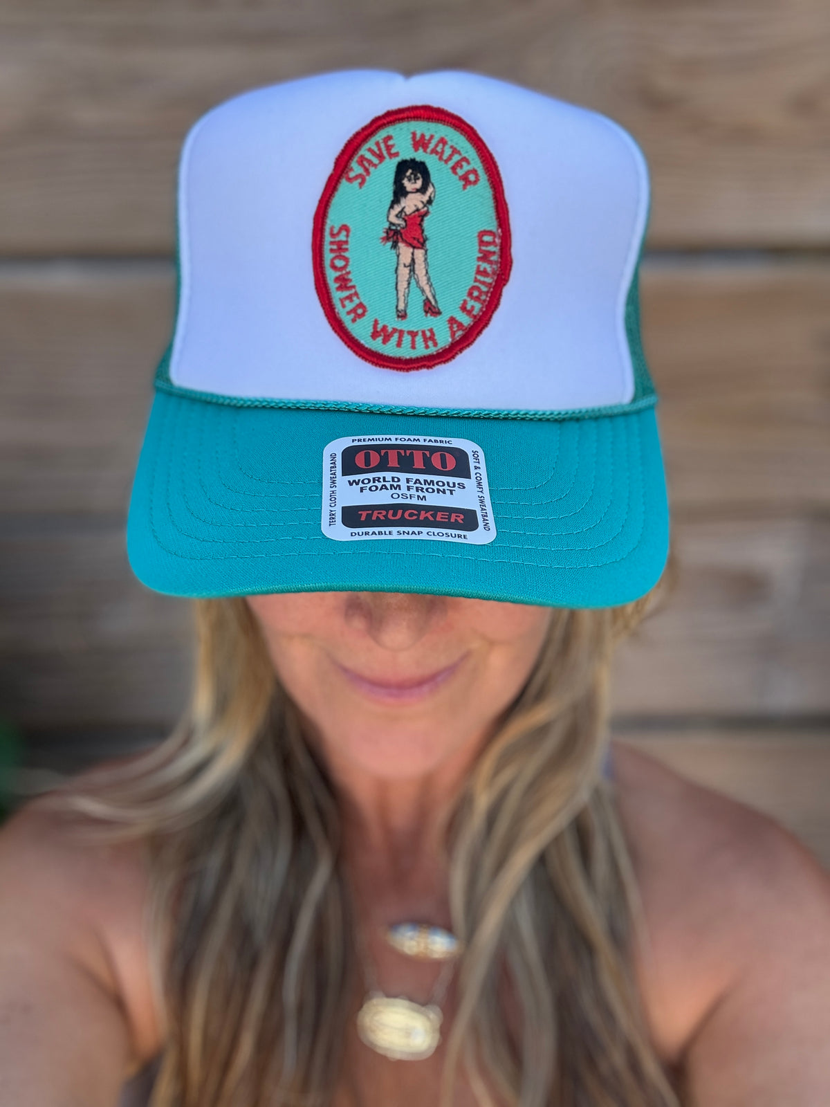 Trucker Hat featuring Vintage Patch- save water