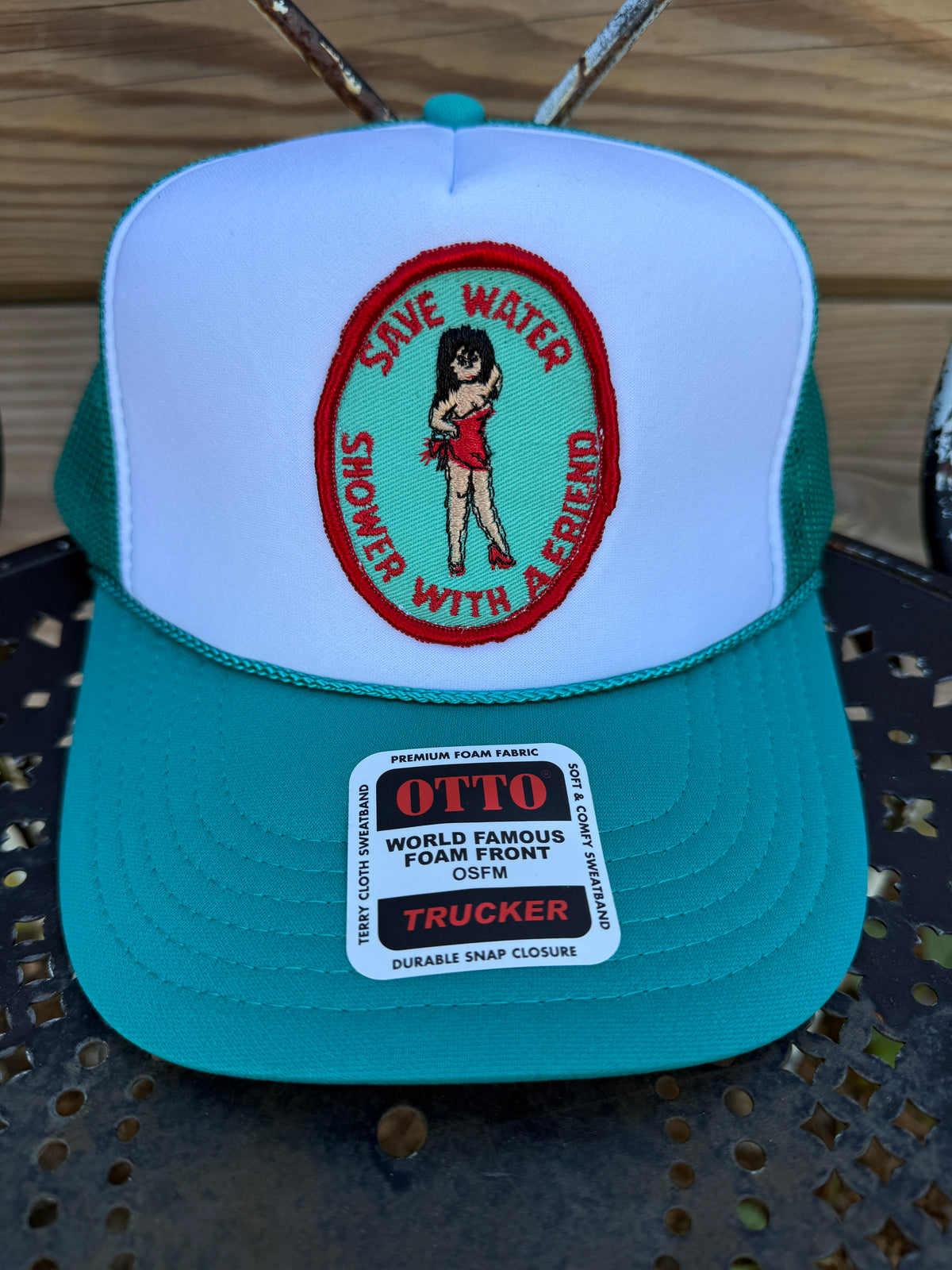 Trucker Hat featuring Vintage Patch- save water
